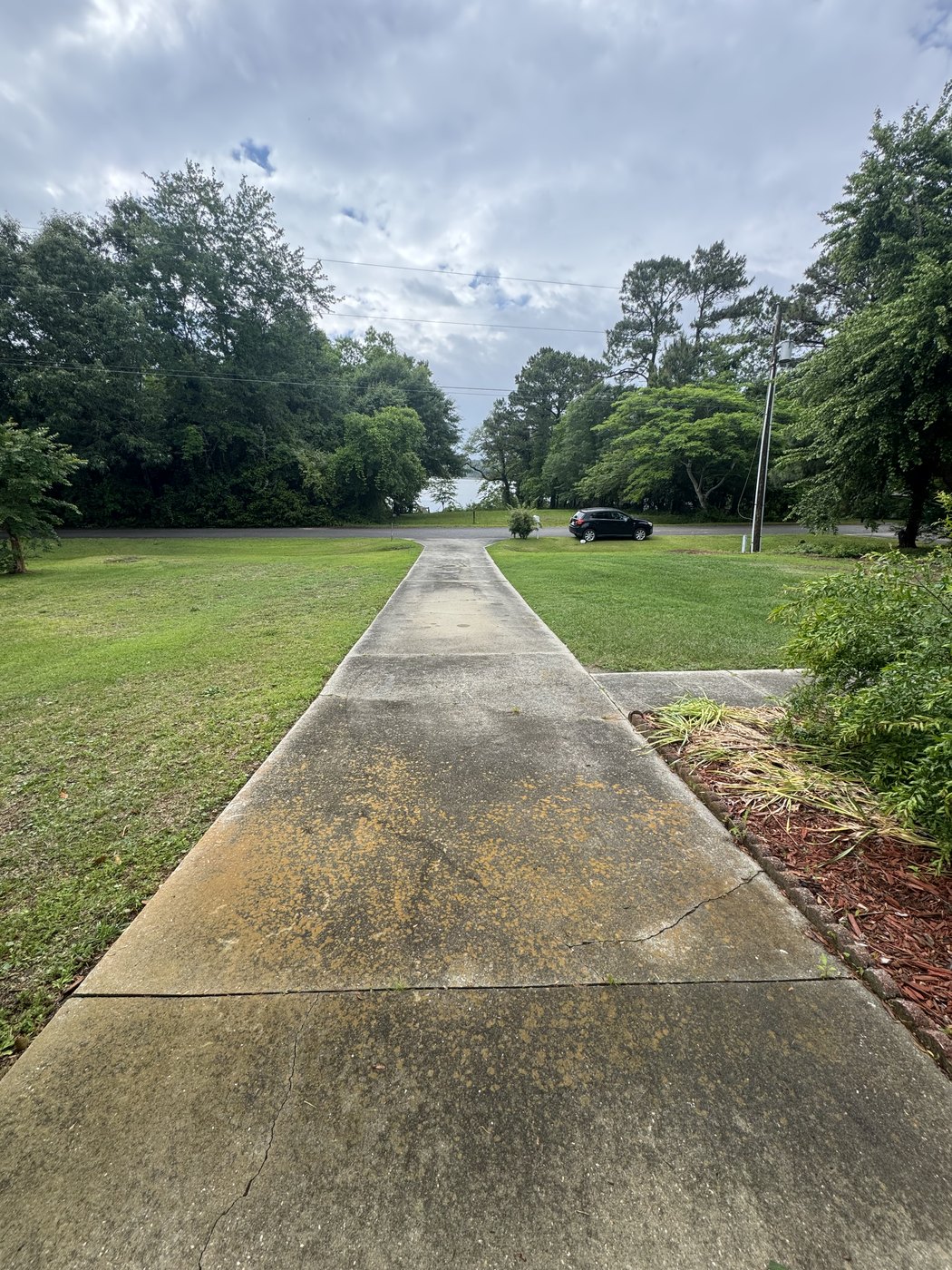 Michigan driveway before pressure washing